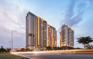 Toàn cảnh các tòa căn hộ Feliz En Vista Quận 2 lên đèn lúc hoàng hôn, nổi bật với kiến trúc cao tầng hiện đại bên tuyến đường lớn, góp phần tạo điểm nhấn cho khu vực Thạnh Mỹ Lợi.